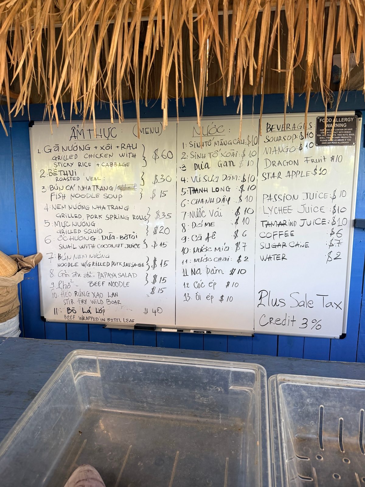 Handwritten whiteboard menu at Vườn Xoài in Tampa listing Vietnamese dishes, fresh juices and prices